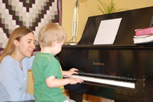 Freya teaching piano